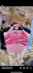 Mixed Bally baring top